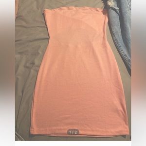 Bought this for a gender reveal but never ended up having one, never worn!